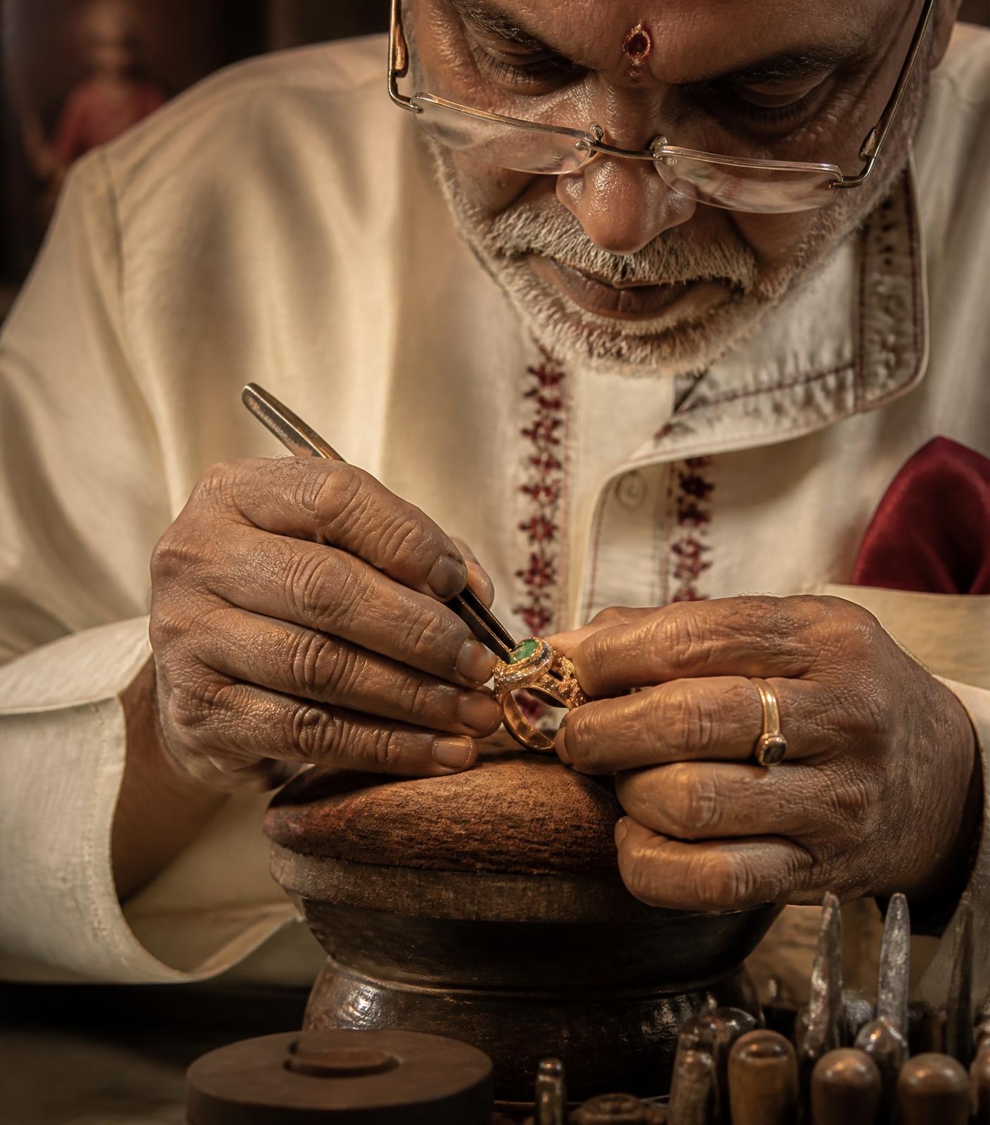 A Pasidi gemstone being set by hand